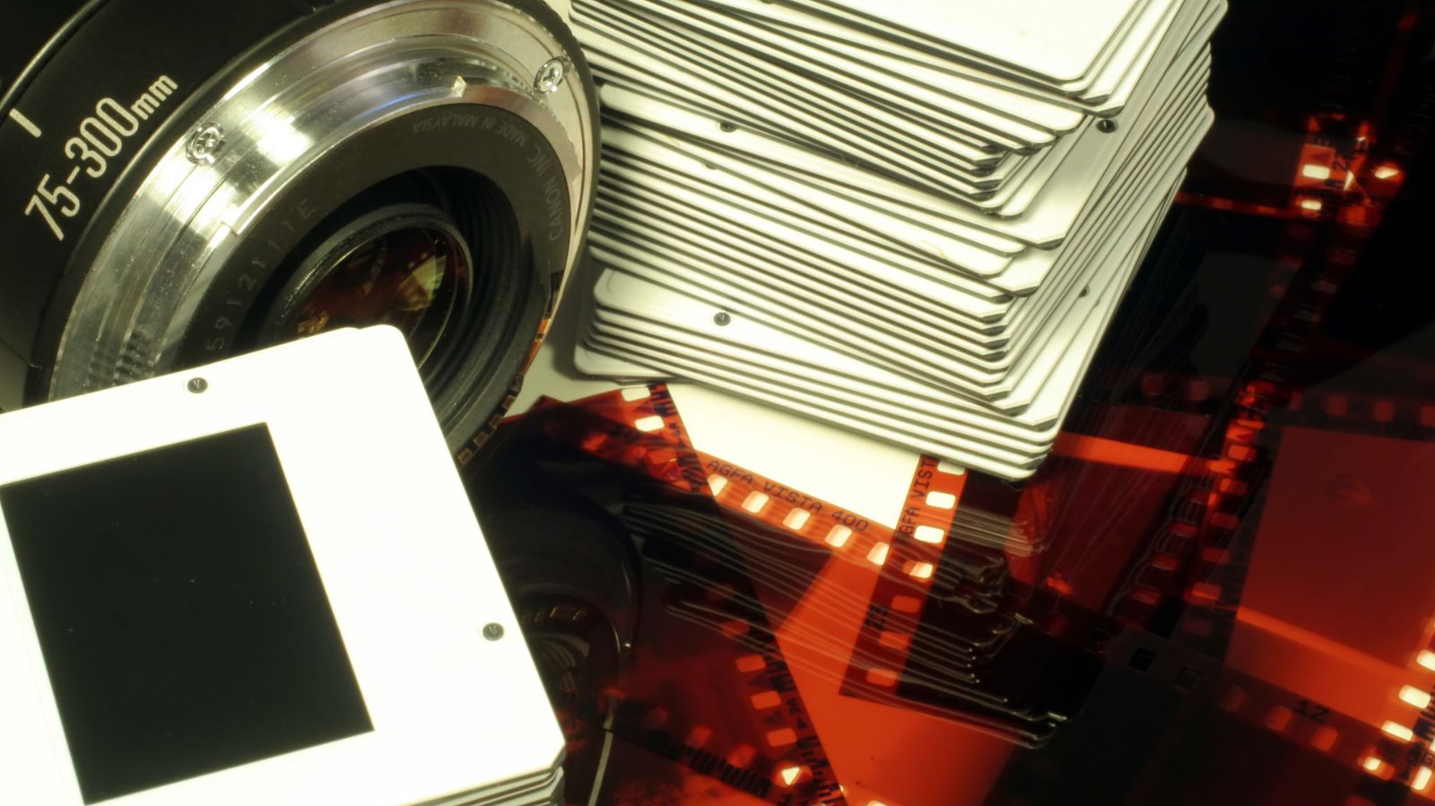 35mm slides and film negatives being digitized in studio lighting
